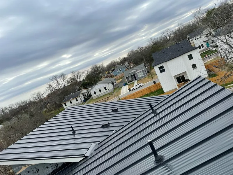 Standing seam metal roof panels with vents for Skylight Repair in White Lake